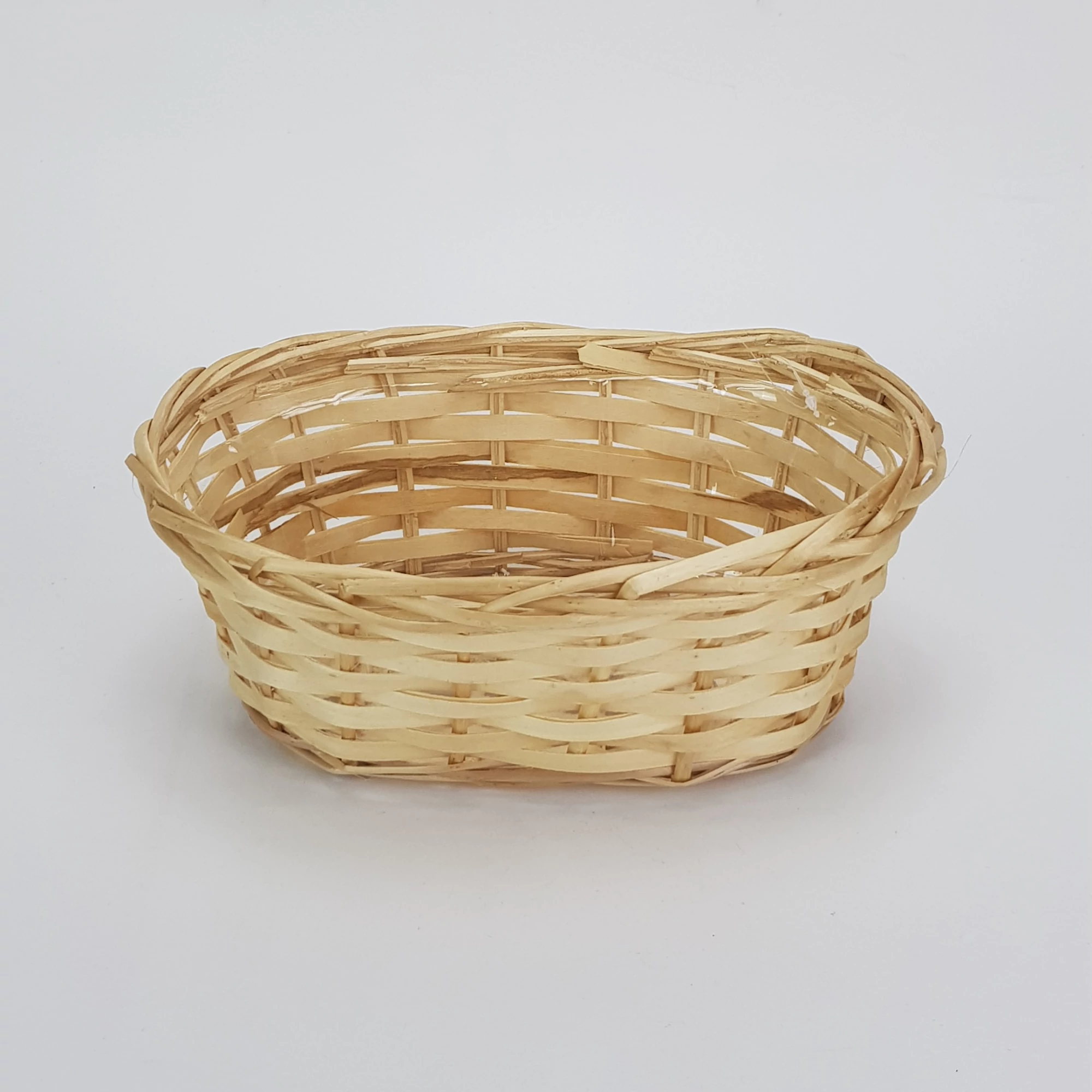 Fonott ovál kosár 25*15cm - natúr